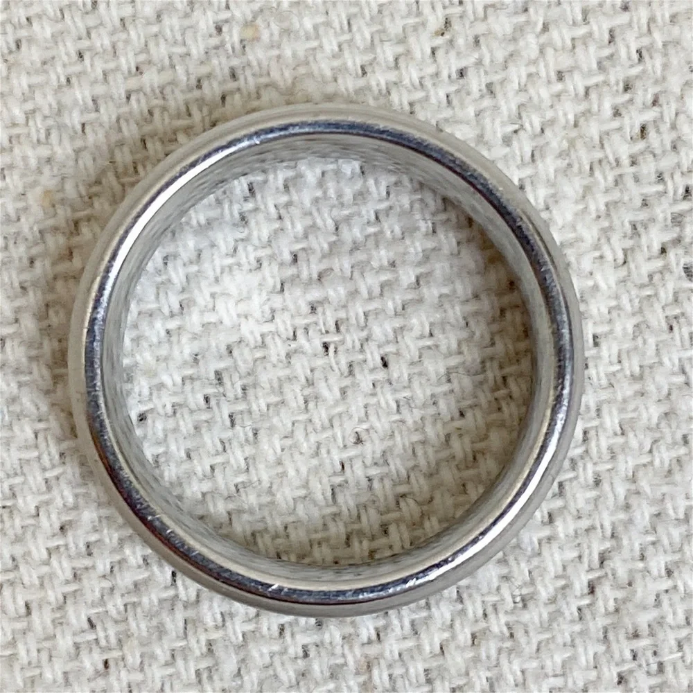 Triton Stainless steel/14k band ring